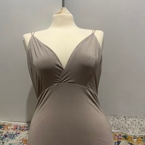 Tan body suit. Size large. Open back. Worn.